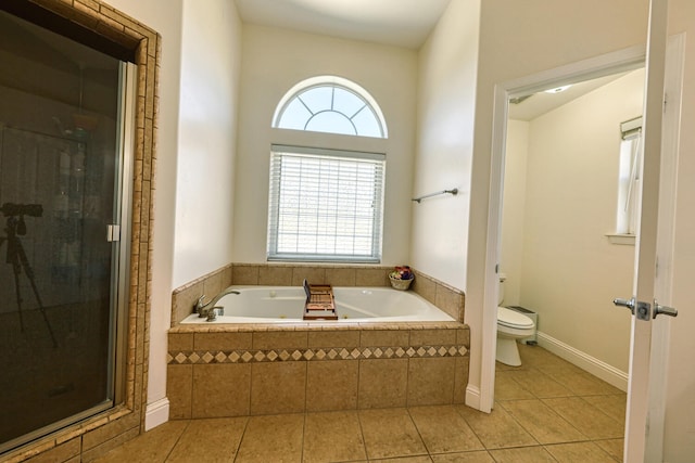 24500 Jacaranda Dr, Tehachapi, CA 93561 - full bathroom featuring toilet, tile patterned floors, a bath, and a stall shower