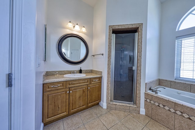 24500 Jacaranda Dr, Tehachapi, CA 93561 - bathroom featuring tile patterned floors, a shower stall, plenty of natural light, and vanity