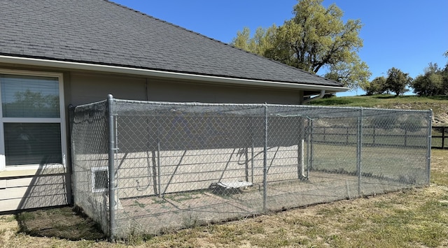 24500 Jacaranda Dr, Tehachapi, CA 93561 - view of side of property with roof with shingles and fence