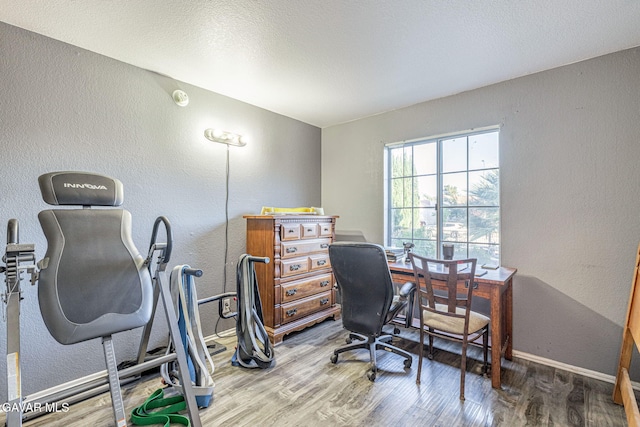 6019 Diamond St, Palmdale, CA 93552 - office area featuring wood finished floors and a textured wall