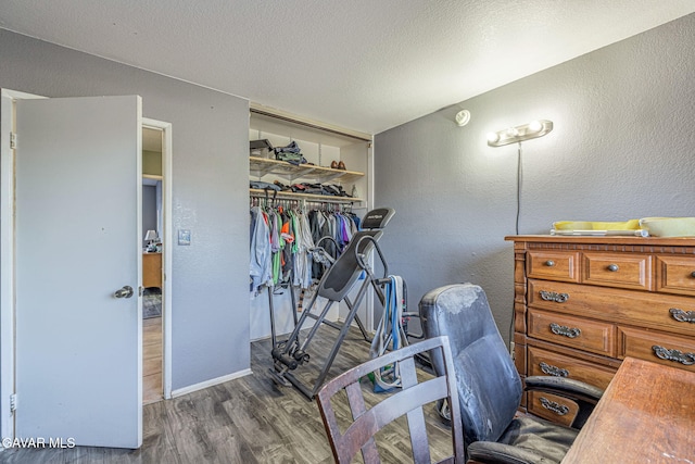 6019 Diamond St, Palmdale, CA 93552 - office with wood finished floors and a textured wall