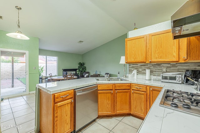 6019 Diamond St, Palmdale, CA 93552 - kitchen featuring stainless steel appliances, vaulted ceiling, a peninsula, extractor fan, and decorative backsplash