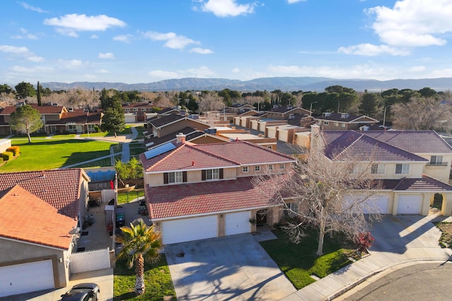 aerial view featuring a residential view and a mountain view