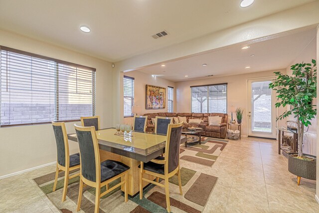2534 Mapleleaf Ter, Palmdale, CA 93551 - dining area with recessed lighting, light tile patterned floors, and baseboards