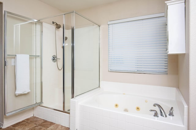 2447 Brompton Ct, Palmdale, CA 93551 - bathroom featuring a stall shower and a jetted tub