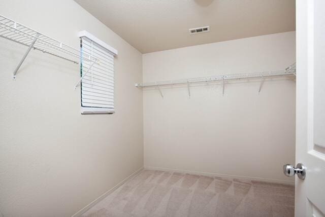 2447 Brompton Ct, Palmdale, CA 93551 - spacious closet with light colored carpet