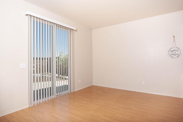2447 Brompton Ct, Palmdale, CA 93551 - spare room with light wood finished floors and baseboards