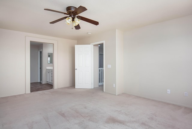 2447 Brompton Ct, Palmdale, CA 93551 - unfurnished bedroom featuring light colored carpet, ensuite bathroom, ceiling fan, and electric panel