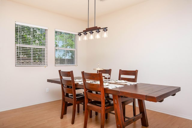 2447 Brompton Ct, Palmdale, CA 93551 - dining area with light wood finished floors and baseboards