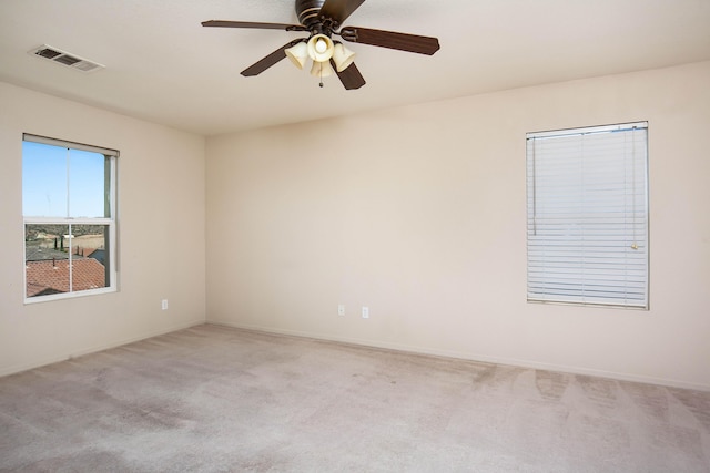 2447 Brompton Ct, Palmdale, CA 93551 - empty room featuring light colored carpet, a ceiling fan, and baseboards