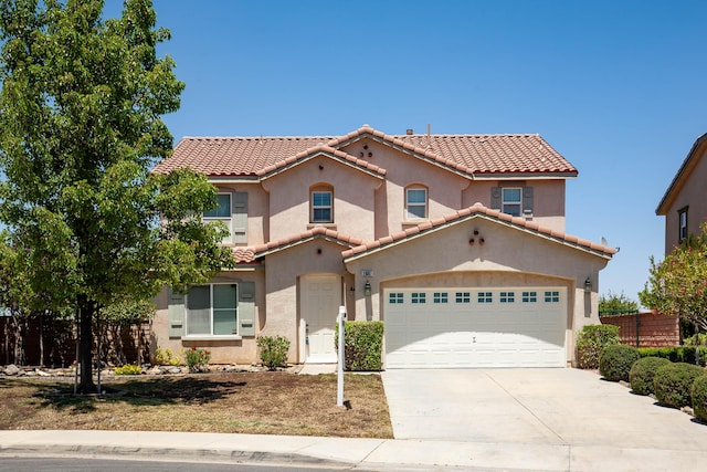 2447 Brompton Ct, Palmdale, CA 93551 - mediterranean / spanish home with a tile roof, concrete driveway, stucco siding, and a garage