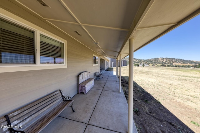 19426 Cavalier Ct, Tehachapi, CA 93561 - view of patio / terrace with a mountain view