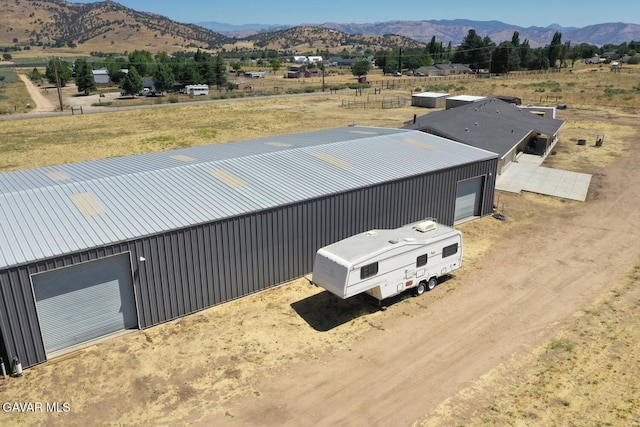 19426 Cavalier Ct, Tehachapi, CA 93561 - aerial view of property and surrounding area featuring a mountainous background
