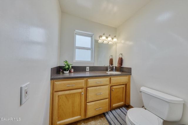 19426 Cavalier Ct, Tehachapi, CA 93561 - bathroom featuring toilet and vanity
