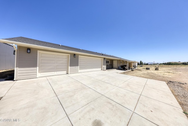 19426 Cavalier Ct, Tehachapi, CA 93561 - view of front of home with concrete driveway and a garage