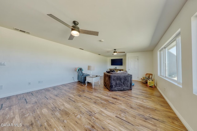 19426 Cavalier Ct, Tehachapi, CA 93561 - living area featuring a ceiling fan and wood finished floors