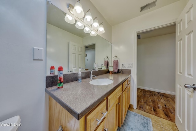 19426 Cavalier Ct, Tehachapi, CA 93561 - bathroom with vanity and tile patterned floors