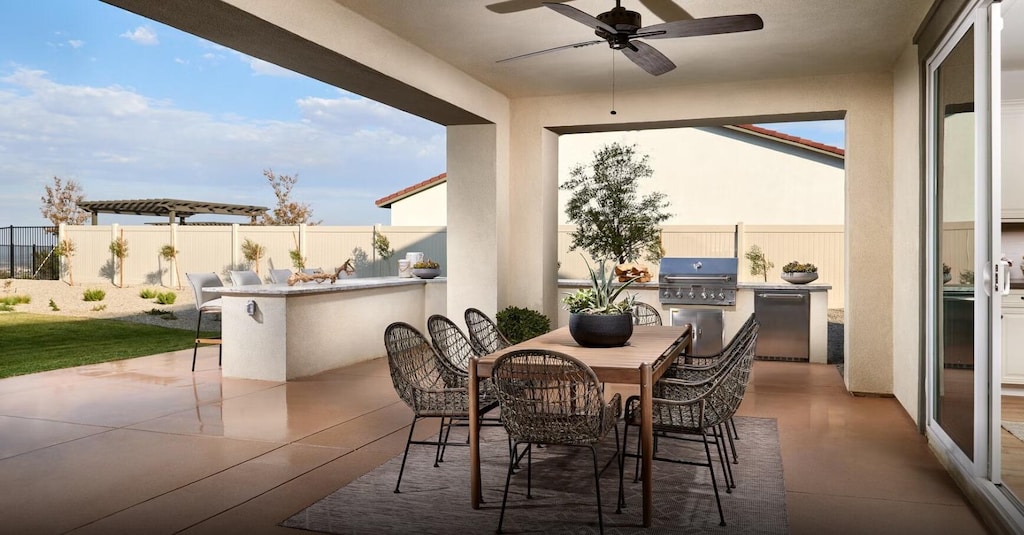 39659 Nicholas Ct, Palmdale, CA 93551 - view of patio with a ceiling fan and exterior bar