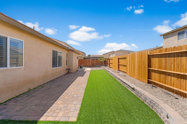 view of yard with a patio