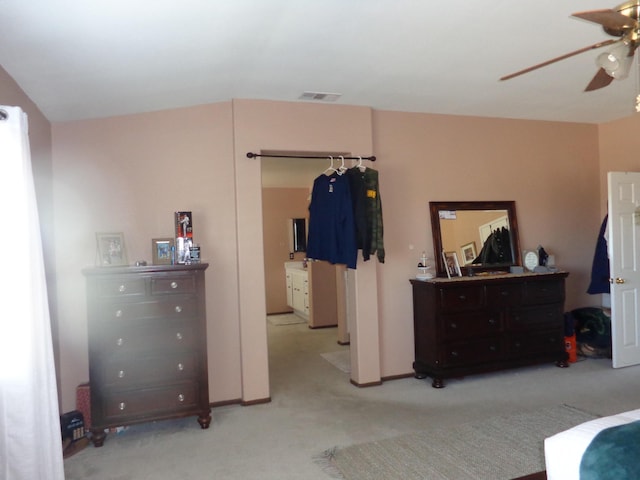 bedroom featuring light carpet and ceiling fan