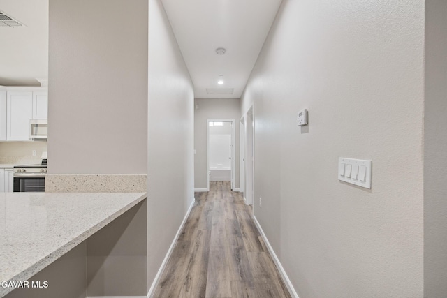 40719 E 171st St, Lake Los Angeles, CA 93535 - corridor with light wood-style floors and recessed lighting