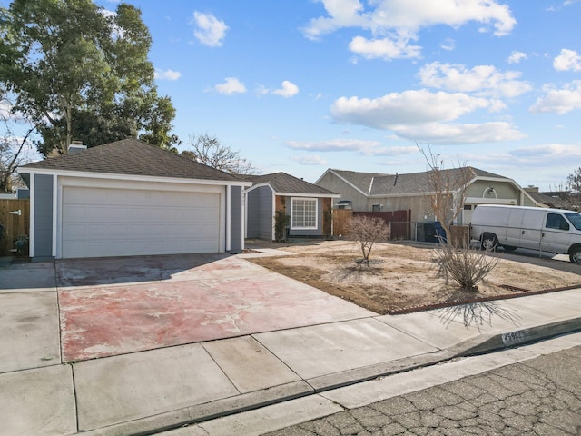 single story home featuring a garage