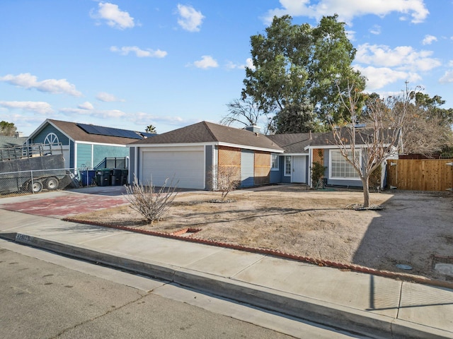 ranch-style home with a garage