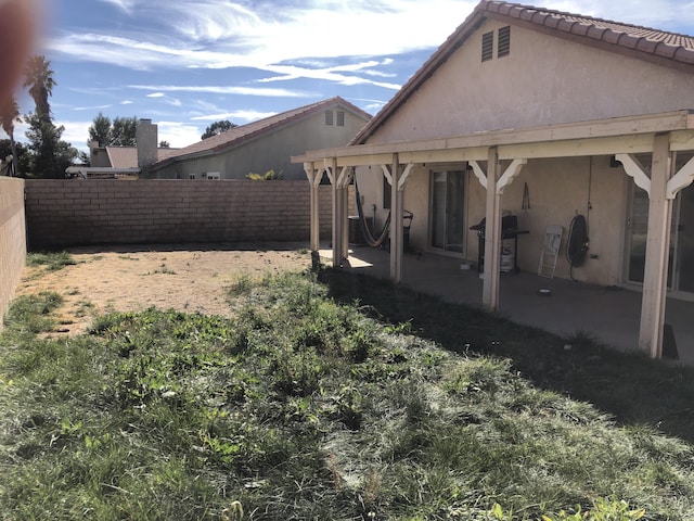 view of yard with a patio area