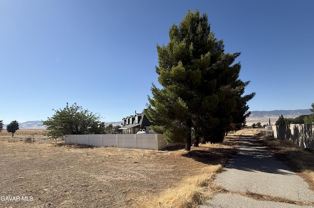 28945 W W Ave C6, Lancaster, CA 93536 - view of yard with a mountain view and a view of rural / pastoral area