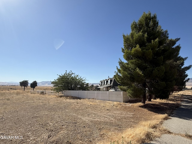28945 W W Ave C6, Lancaster, CA 93536 - view of yard featuring a view of countryside and a mountain view