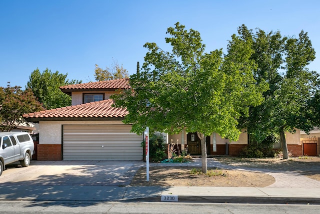 view of front of property with a garage