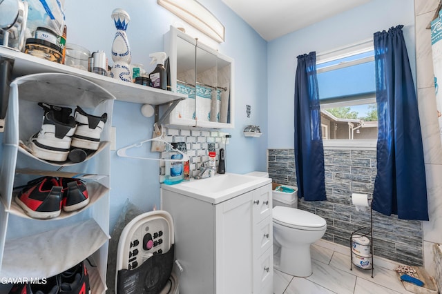 1411 W Ivesbrook St, Lancaster, CA 93534 - bathroom with vanity and marble finish floors