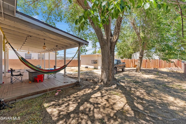 1411 W Ivesbrook St, Lancaster, CA 93534 - view of yard featuring a wooden deck