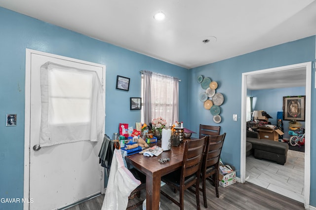 1411 W Ivesbrook St, Lancaster, CA 93534 - dining area featuring wood finished floors