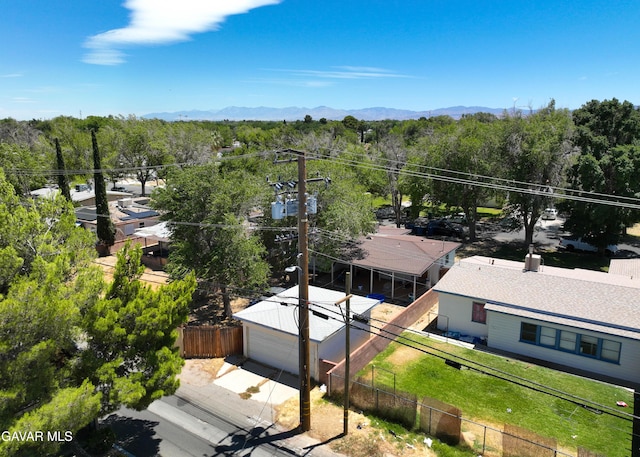 1411 W Ivesbrook St, Lancaster, CA 93534 - view of subject property with a heavily wooded area and a mountain backdrop