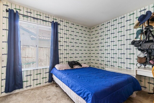 carpeted bedroom featuring wallpapered walls