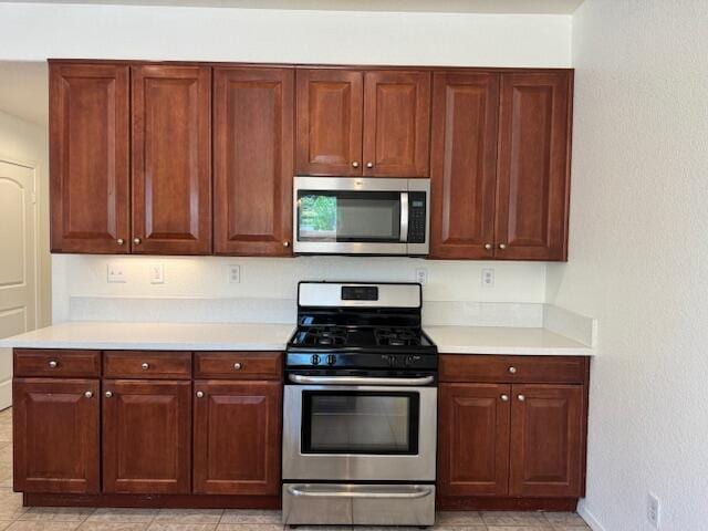 44316 Acacia St, Lancaster, CA 93535 - kitchen with stainless steel appliances and light countertops