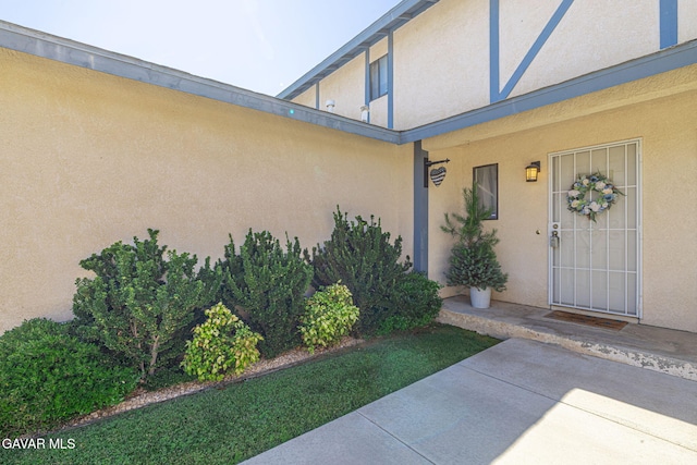 43840 Bobby Jones Dr Apt 22, Lancaster, CA 93536 - view of exterior entry with stucco siding