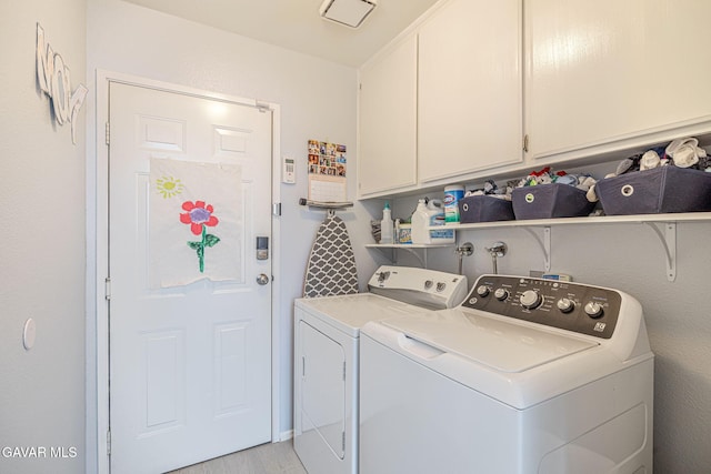 43840 Bobby Jones Dr Apt 22, Lancaster, CA 93536 - laundry area with washer and dryer, cabinet space, and light wood-style floors