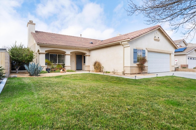 view of front of house with a garage and a front yard