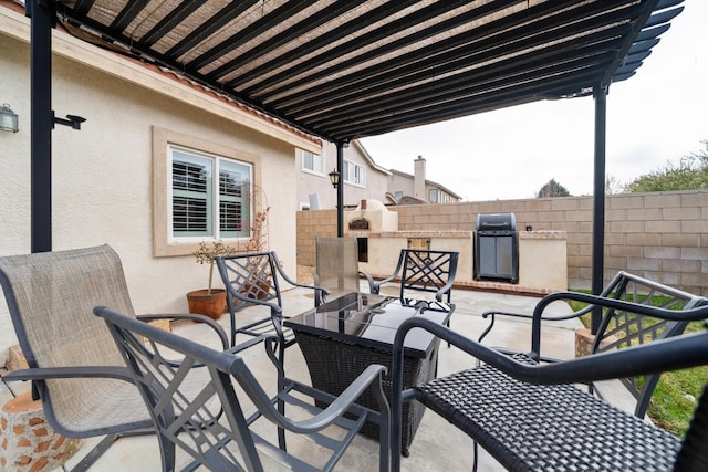 view of patio with area for grilling and grilling area