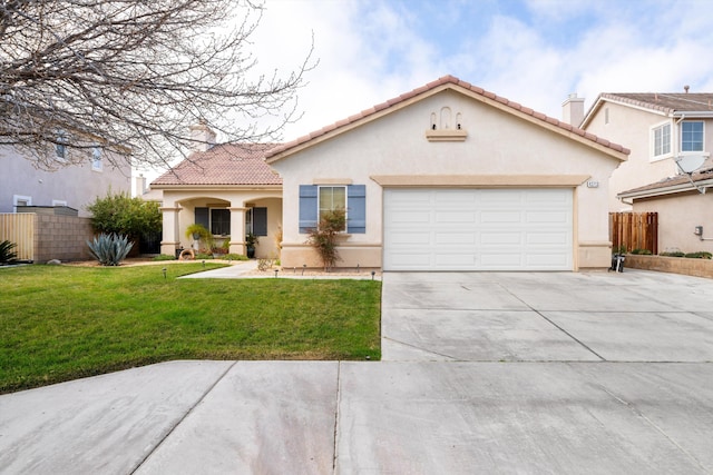 mediterranean / spanish-style house with a garage and a front lawn