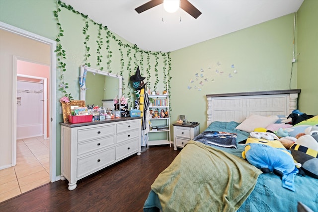 bedroom with dark wood-type flooring and ceiling fan