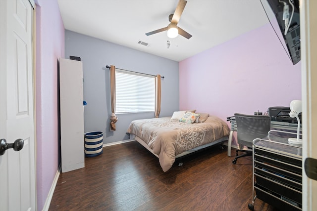 bedroom featuring dark wood-type flooring and ceiling fan