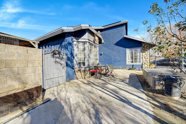 back of house with a patio area