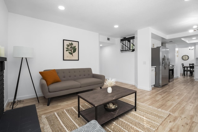 2012 Comstock Ct, Palmdale, CA 93551 - living area featuring baseboards, light wood-style floors, and recessed lighting