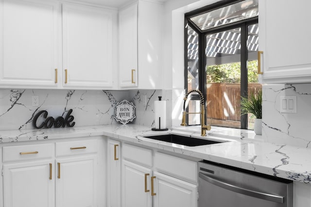 2012 Comstock Ct, Palmdale, CA 93551 - kitchen featuring dishwasher, a sink, white cabinets, and backsplash
