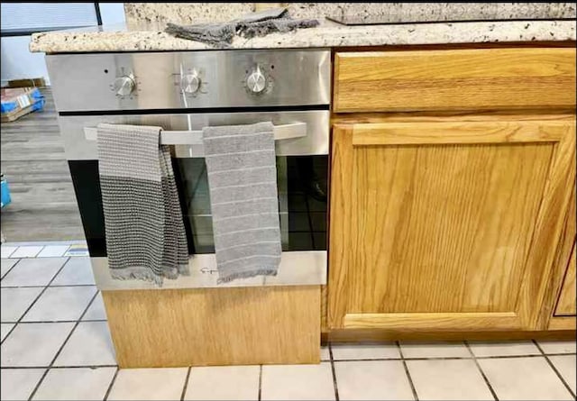 room details with light countertops and oven