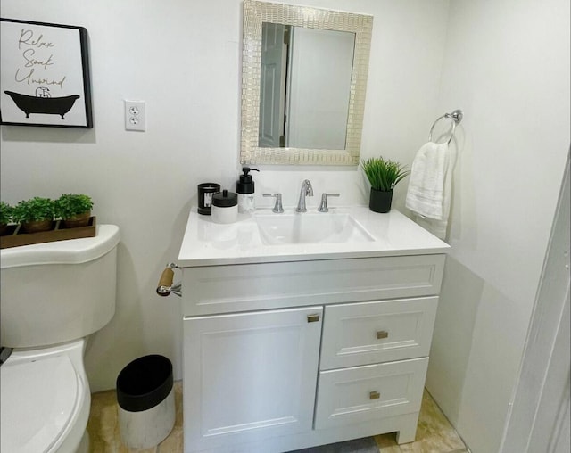 half bath with toilet and vanity