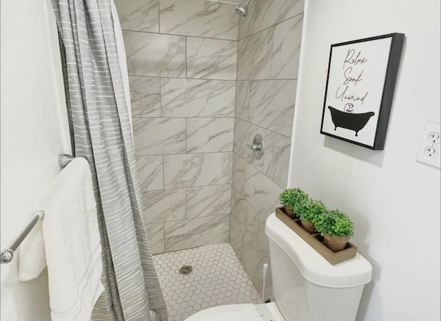 full bath with a shower stall and toilet